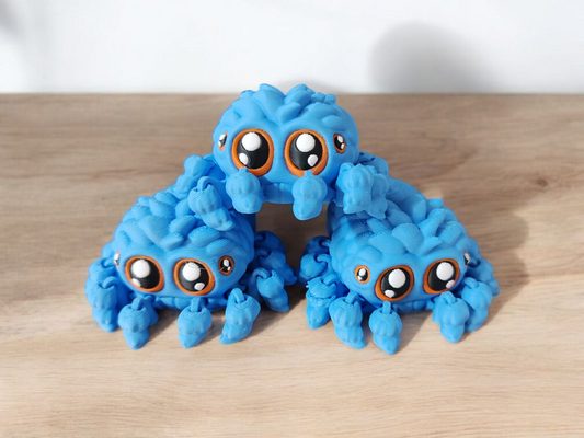 Blue spider with eight long articulated legs