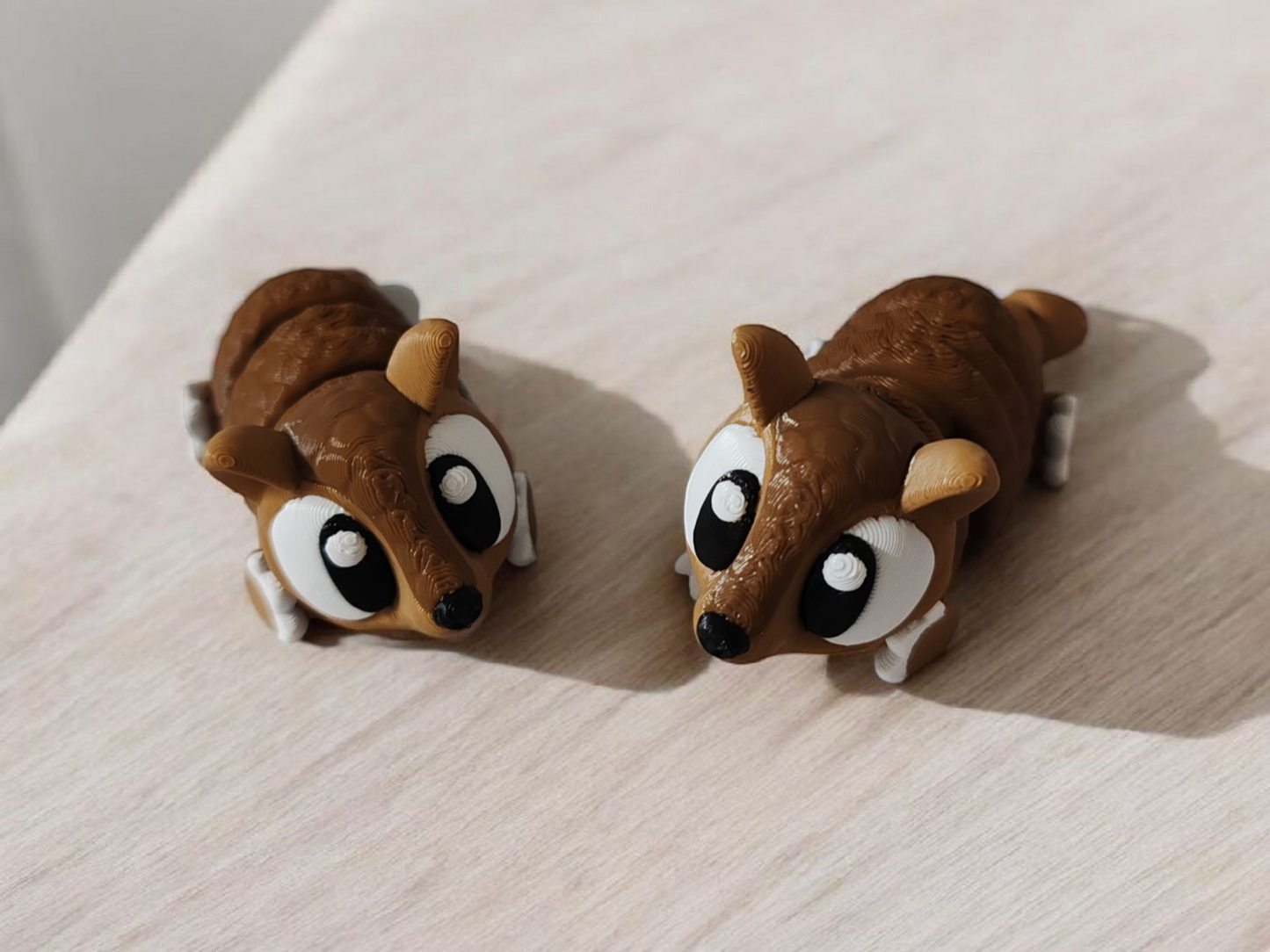 Gray armadillo with segmented articulated shell armor