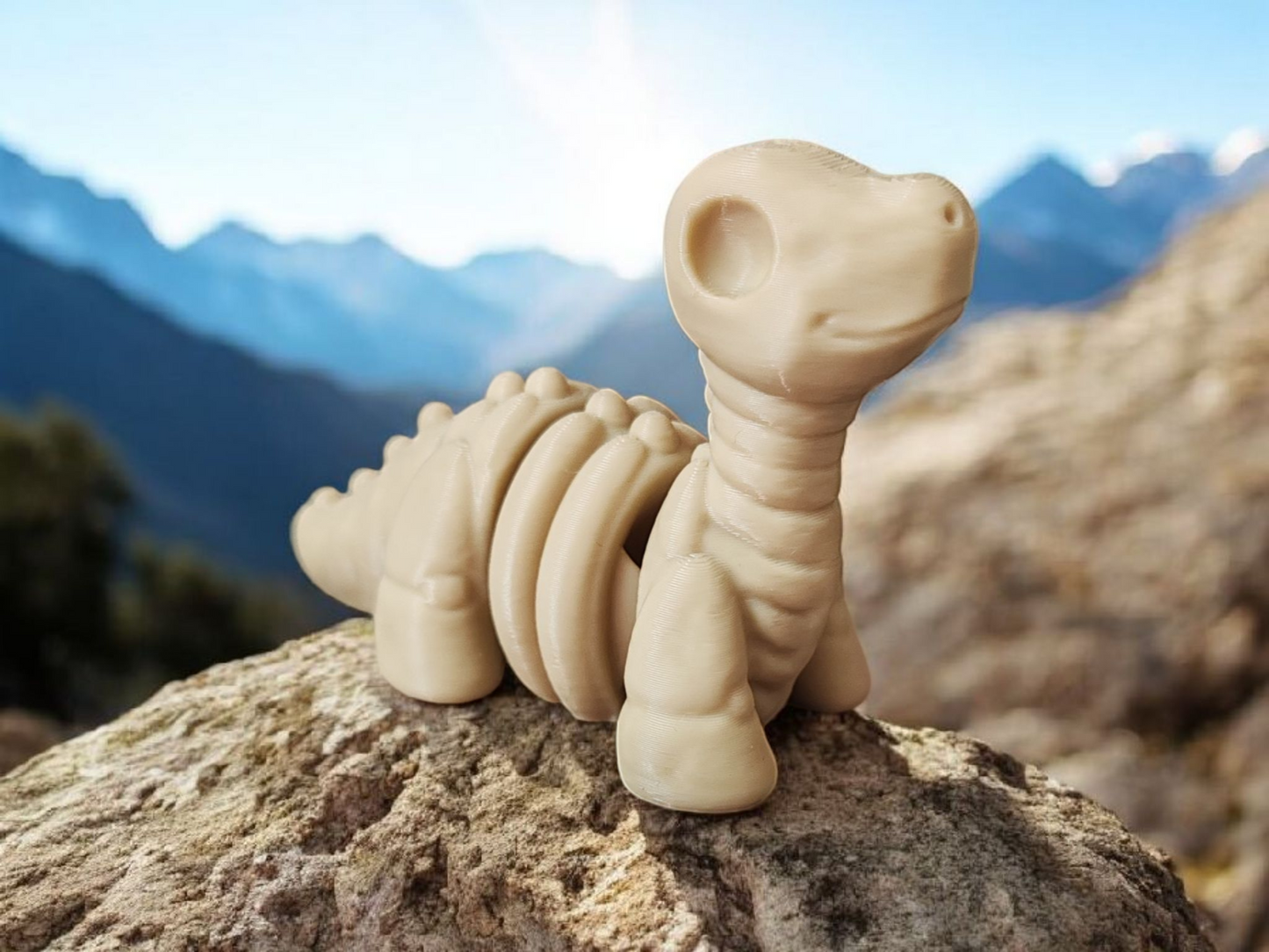 White Brontosaurus dinosaur skeleton with articulated bones and long neck