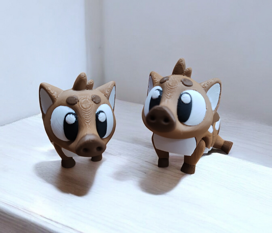 Brown warthog figurine with articulated legs and tusks