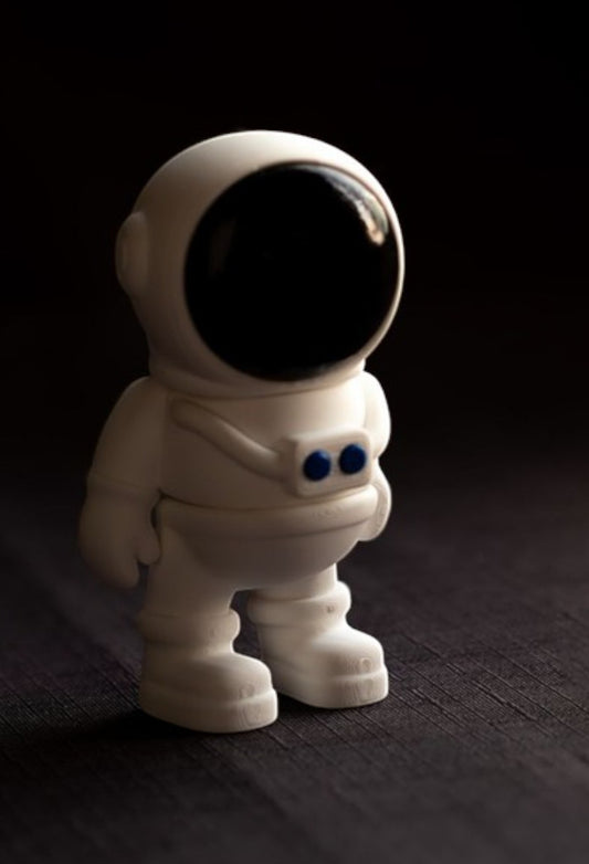 White flexible astronaut figurine in space suit