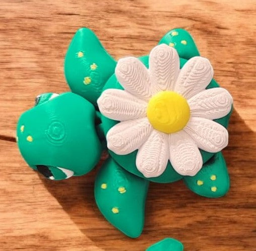 White and yellow daisy articulated turtle collectible