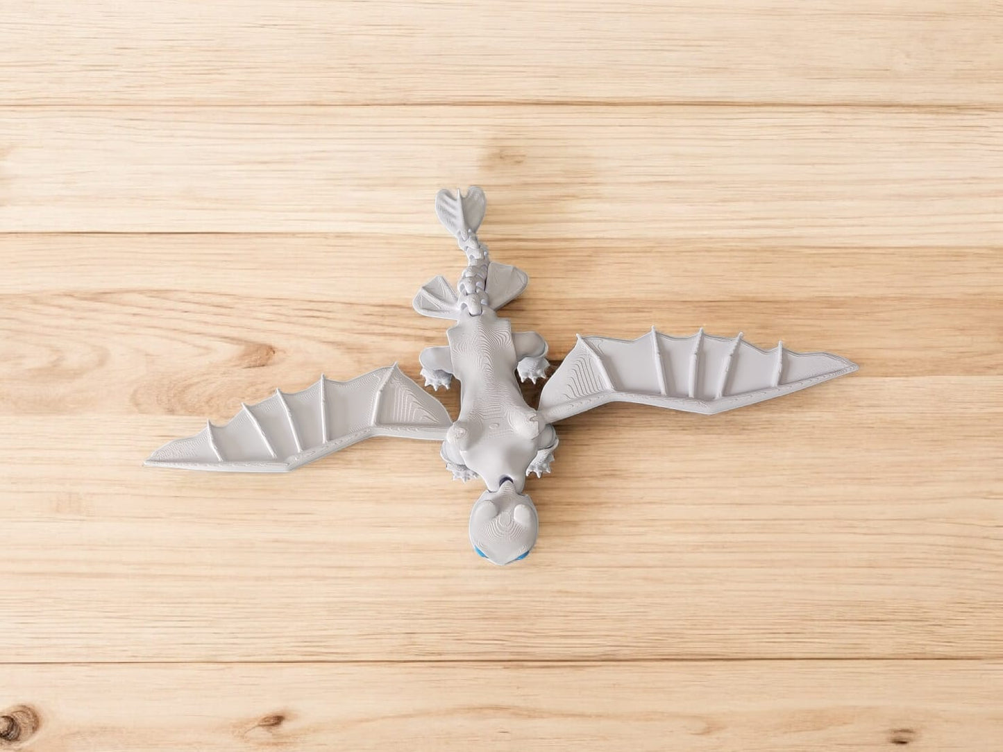 Side view of Light Fury dragon showing sleek flexible design