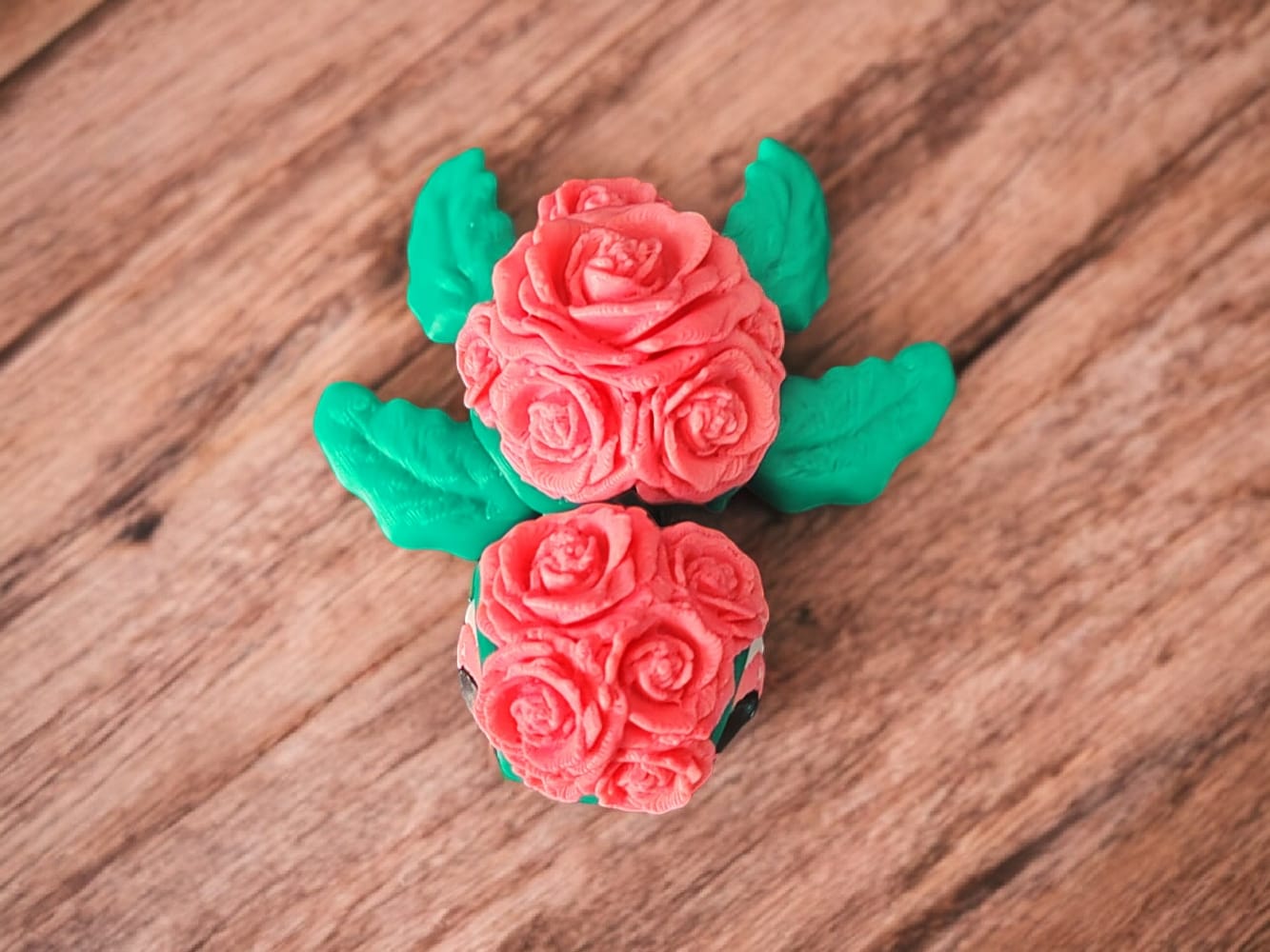 Side view of rose turtle showing layered petal design
