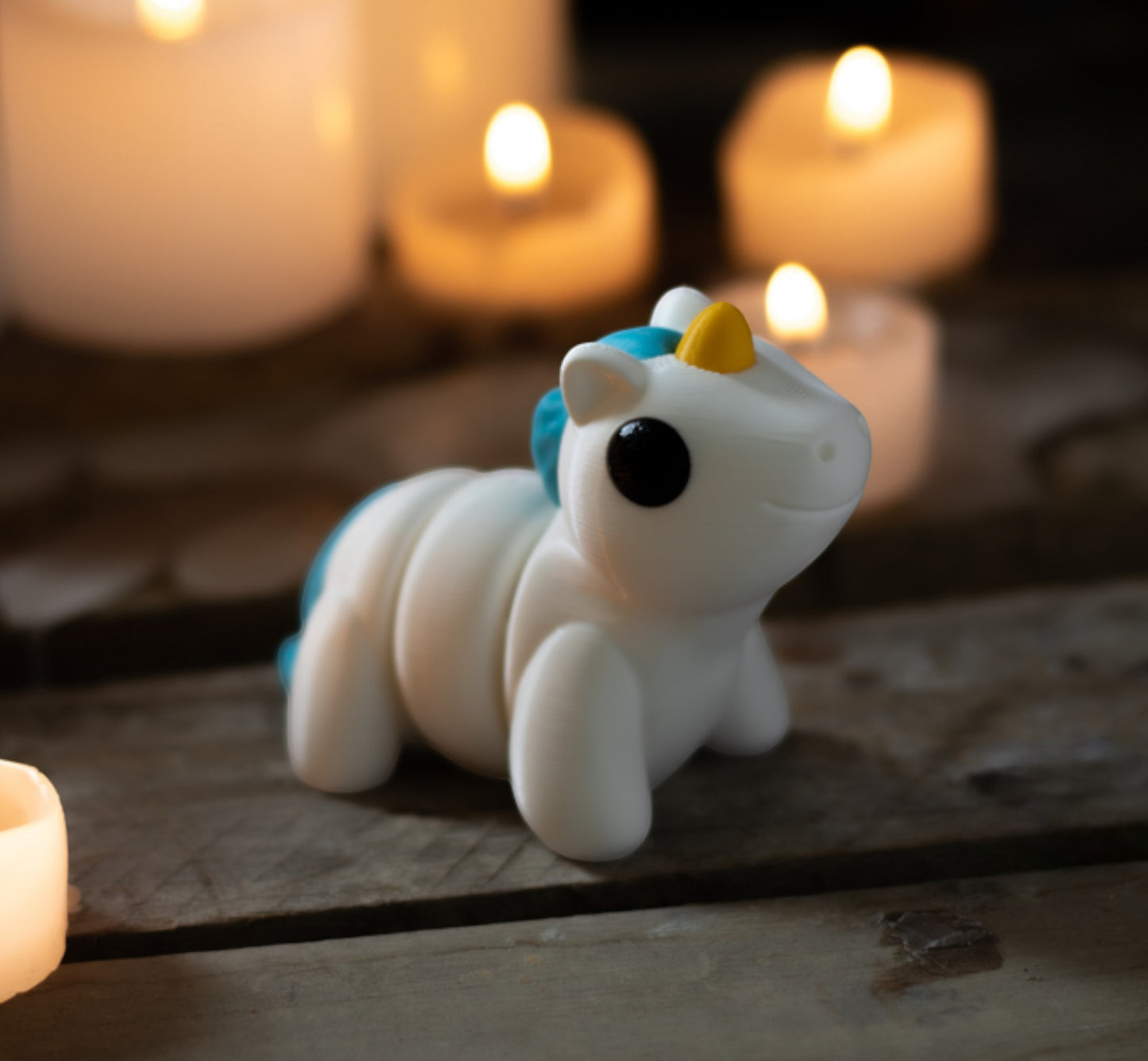 White flexible unicorn figurine with horn and mane