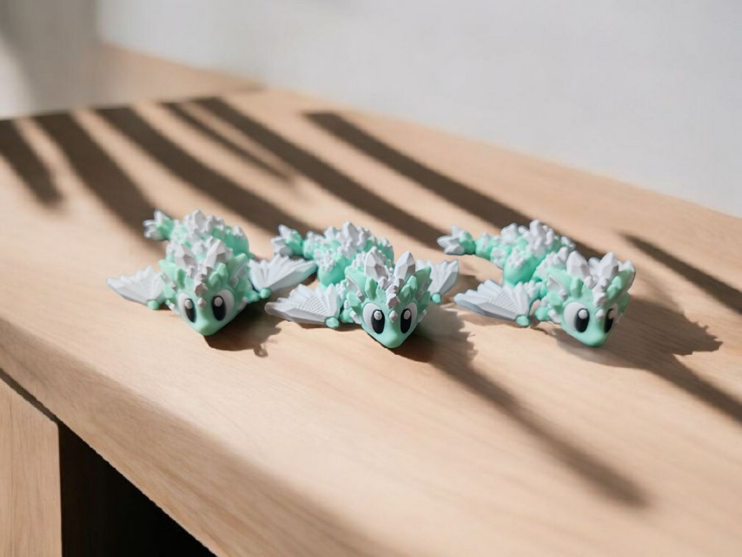 Mint green crystal dragon with articulated body and wings