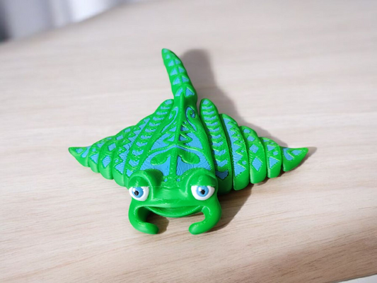 Gray articulated stingray with wide flexible wings