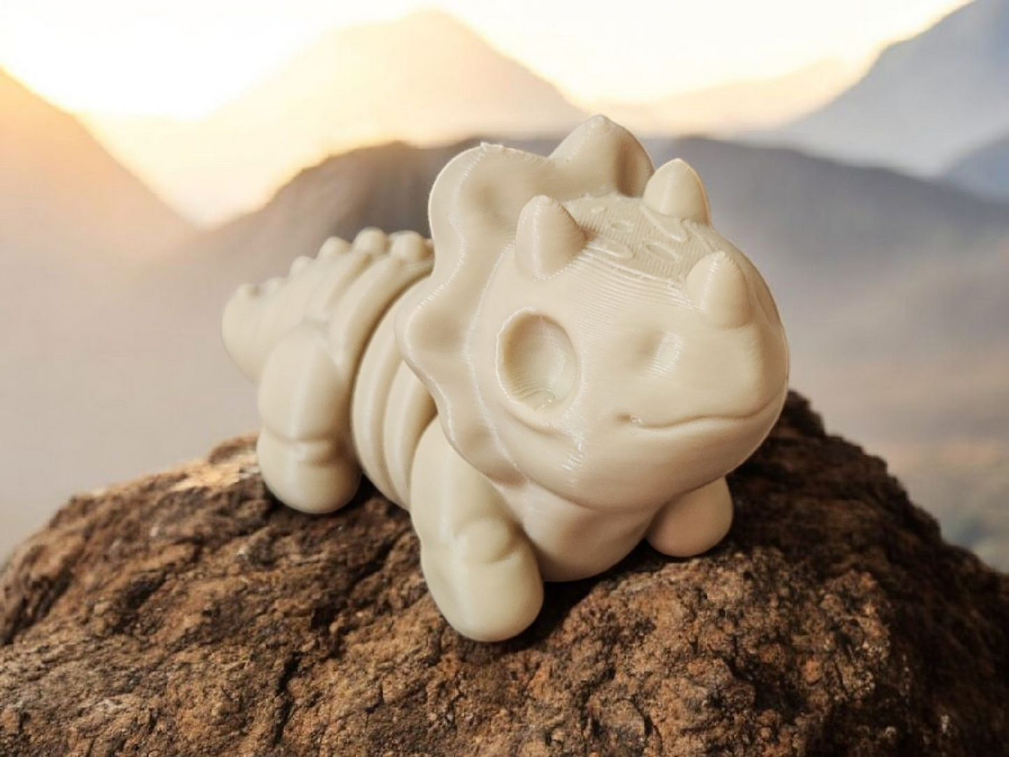 White Triceratops dinosaur skeleton with three horns and frill