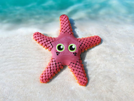 Large orange articulated starfish with five flexible arms