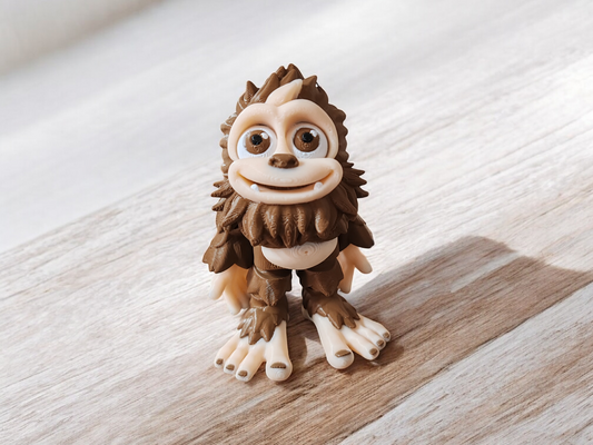 Brown Big Foot creature with articulated arms and legs