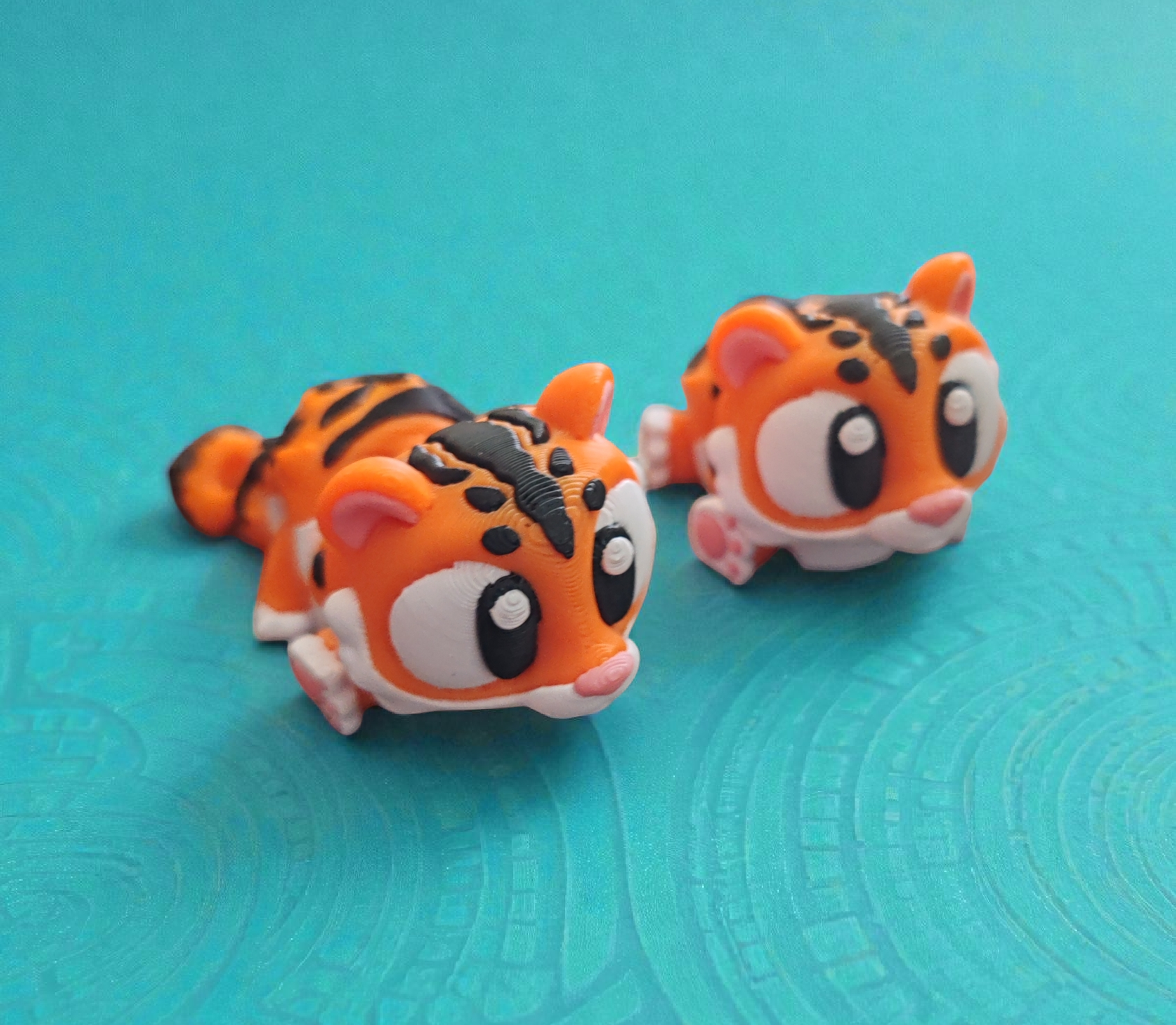 Orange tiger with black stripes and articulated body