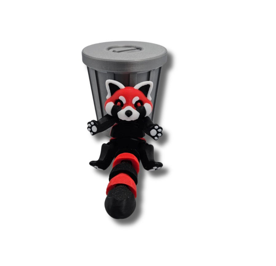 Red and brown articulated red panda figurine