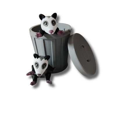 Gray articulated possum figurine with long tail