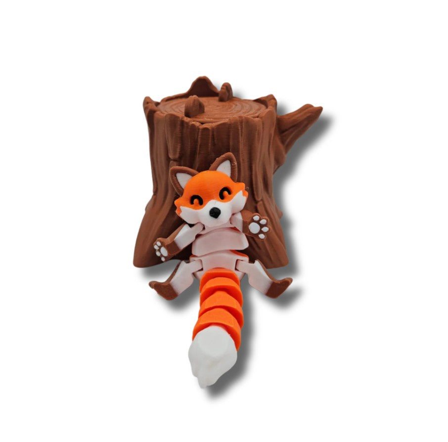 Articulated fox on tree stump display base