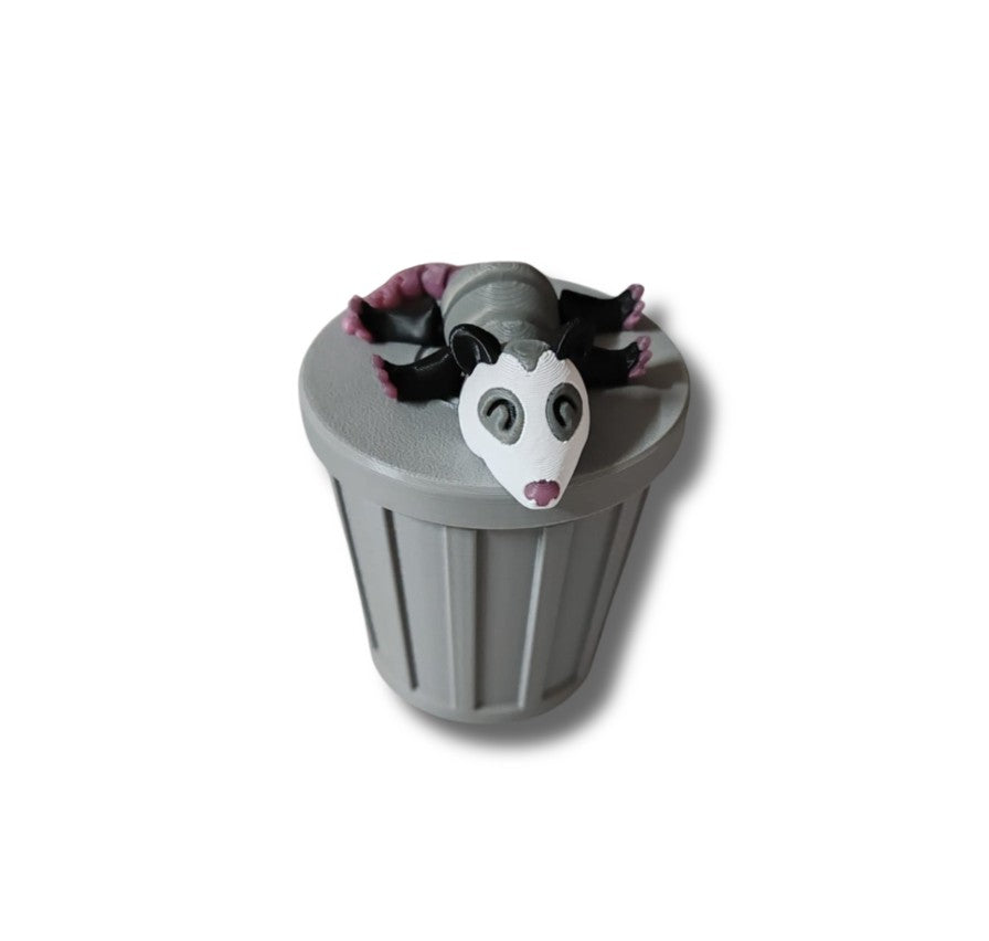 Possum trash animal with curved articulated tail