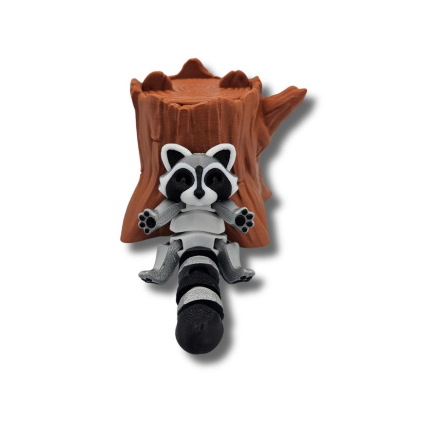 Articulated raccoon on tree stump display base