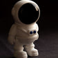 White flexible astronaut figurine in space suit