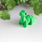 Green flexible Brontosaurus dinosaur figurine with long neck