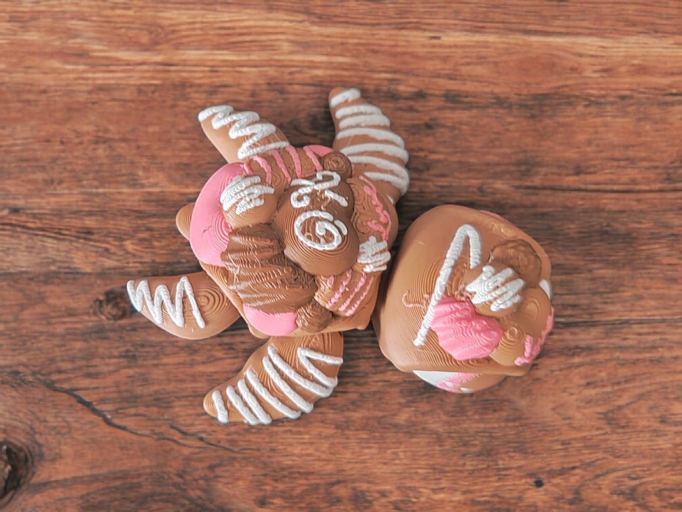 Side view of brown chocolate turtle figurine showing articulated segments