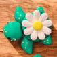 White and yellow daisy articulated turtle collectible
