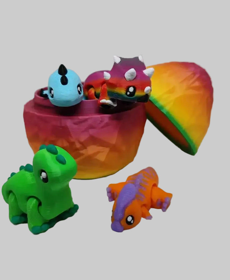 Four colorful dinosaur hatchlings emerging from collectible egg