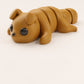 Brown flexible dog figurine with articulated legs