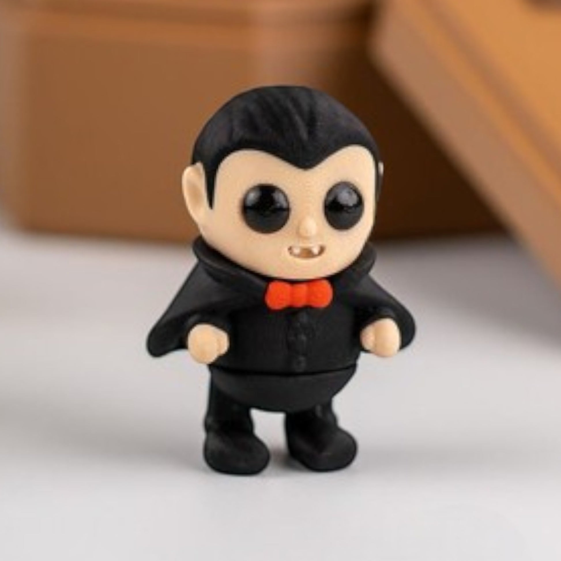 Black flexible Dracula vampire figurine with cape