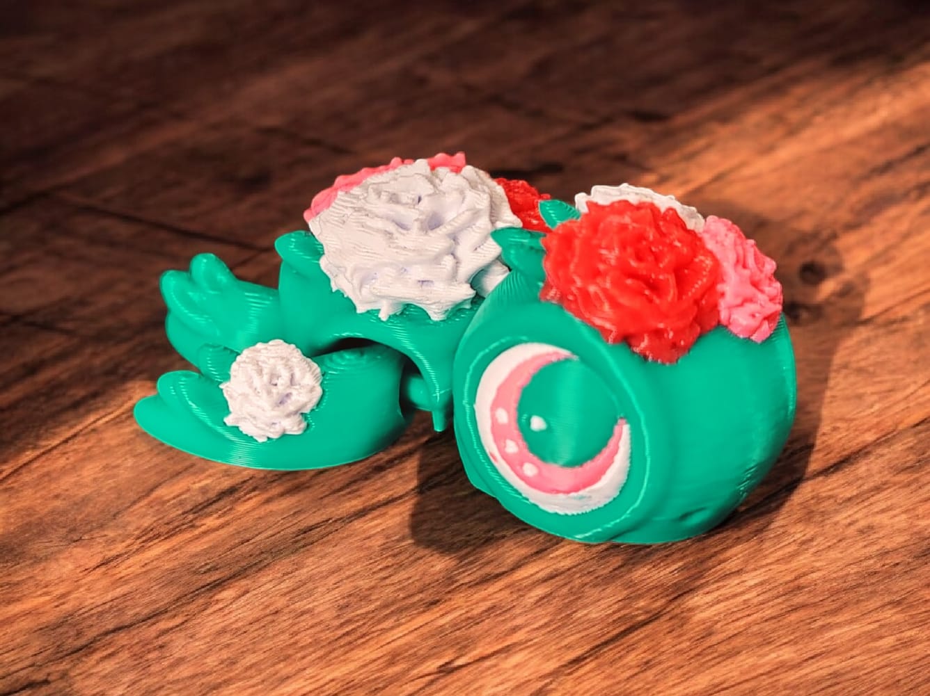 Pink and purple flower turtle with articulated petals on shell