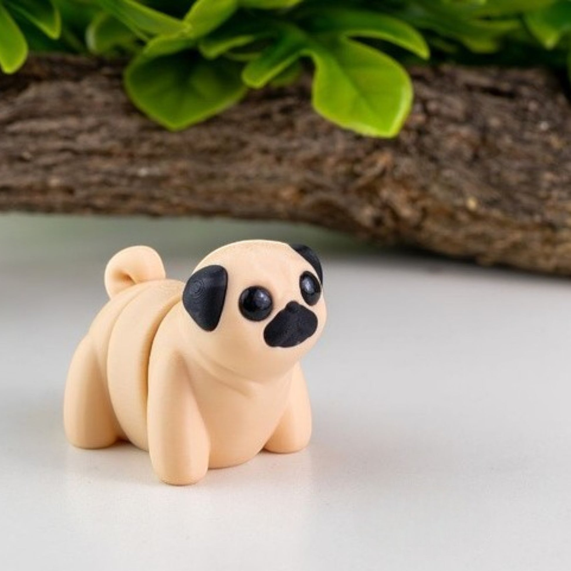 Brown flexible pug dog figurine