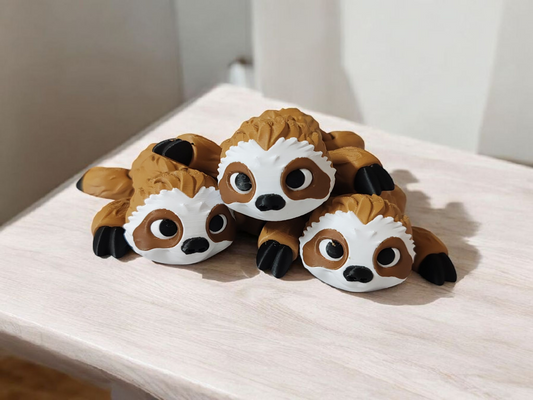 Brown articulated sloth with long flexible arms