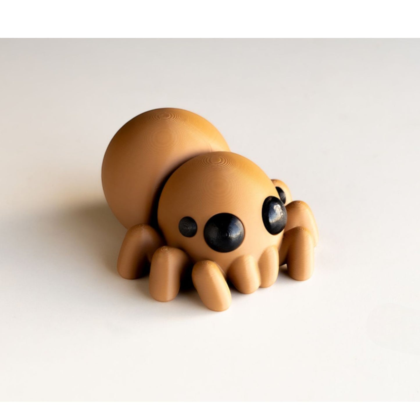 Black flexible spider figurine with eight articulated legs