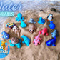 Collection of colorful FlexiFriends water animal figurines including dolphin, shark and octopus