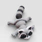 Raccoon figurine display with trash can base
