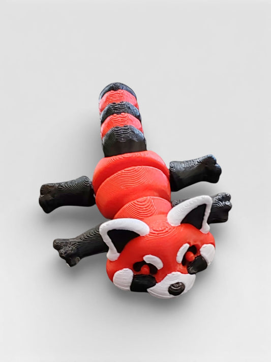 Red panda on display base showing articulated body
